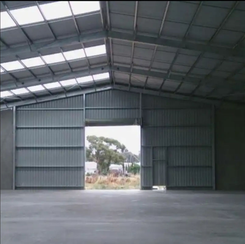 Construcción de acero prefabricado contemporáneo Taller de fábrica Tipo de puerta de rodillo